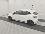 a picture of a white car parked in a garage