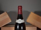 a bottle of wine that is sitting on a table