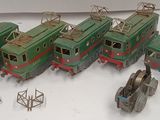 a lot of toy trains that are sitting on a table
