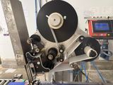 an image of a machine that is working on a piece of paper