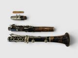 three different types of musical instruments on a white surface