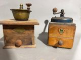 two old wooden grinders and a small grinder