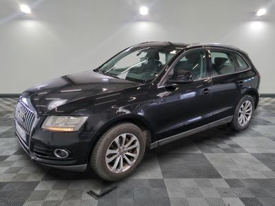 an image of a black audi suv parked in a garage