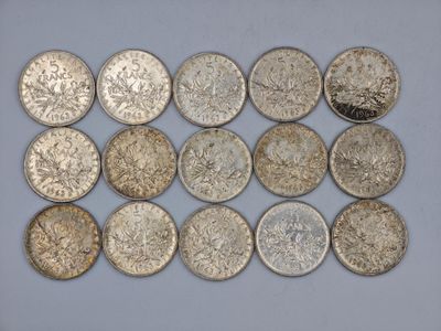a close up of a bunch of coins on a table