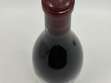 a bottle of wine that is sitting on a table