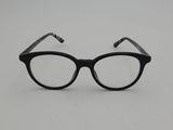 a close up of a pair of glasses on a white surface