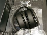 a box with a pair of headphones inside of it