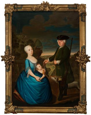 portrait d'un homme et d'une femme avec un enfant dans un paysage
