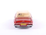 a toy car that is sitting on a white surface