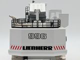 a toy truck with a crane on top of it