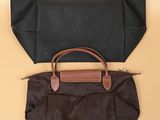 two black and brown bags on a yellow background