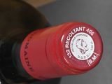 a bottle of wine that is sitting on a table