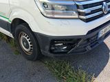 a white van parked on the side of the road
