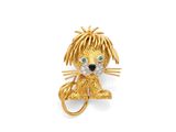 une broche en forme de lion, en or et diamants, aux yeux verts