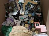 a cardboard box filled with assorted items in it