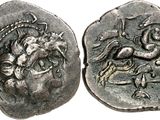 a close up of a coin with a horse on it
