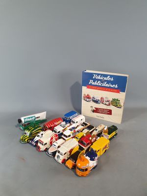 a box of assorted toy cars on a table