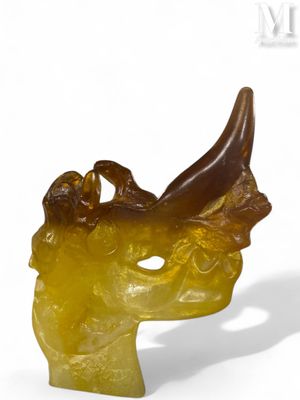 an image of a sculpture of a woman ' s head with horns on it