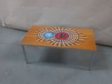 a small table with a spider - man design on it