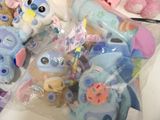 a lot of stuffed animals that are sitting on a table