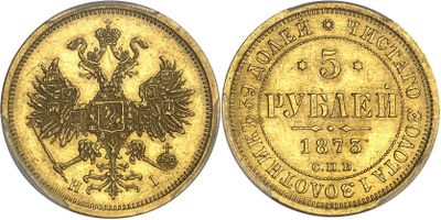 a gold coin with the image of a bird on it