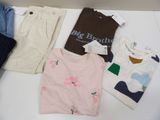 a lot of clothes that are on a table