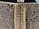 a close up of a mannequin torso with a zipper on it