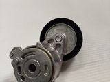 a close up of a metal object on a white surface