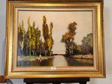 une image d'un tableau sur un chevalet dans une pièce