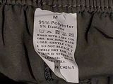a close up of a label on a black jacket