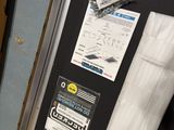 a picture of a bulletin board with a bunch of items on it