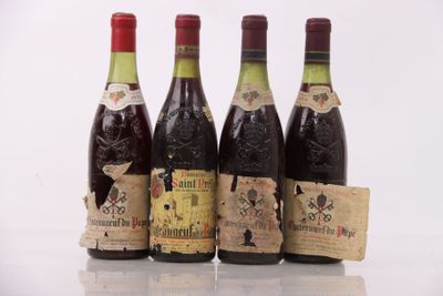 three bottles of wine are lined up on a table