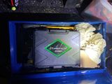 a blue box with a green diamond on top of it