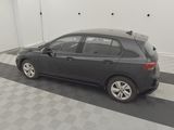 a picture of a black car parked in a garage