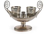 an image of a silver plate with three cups on it