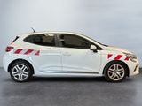 a picture of a white car with a red stripe on the side