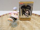 a figurine that is sitting on a table