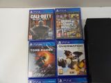 a lot of video games on the table next to each other