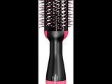 un gros plan d'une brosse à cheveux sur fond blanc