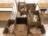 many boxes of wood chips in the middle of a room