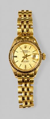 an image of a gold rolex watch on a white background