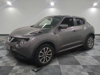 the nissan juke suv is parked in a clean room