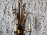 a picture of a wall mounted light fixture on a wall