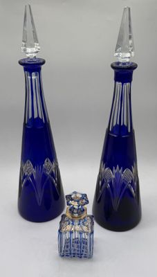 pair of cobalt blue glass decanters and a small glass box