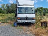 a truck that is parked on the side of the road