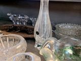 many glass items on the counter in this room