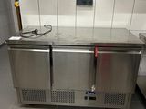 a stainless steel counter in a commercial kitchen