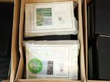 a box with a lot of papers in it