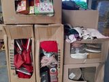 a stack of boxes and boxes on a pallet in a room