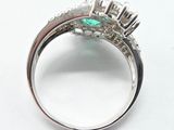 an image of a close up of a ring on a white surface